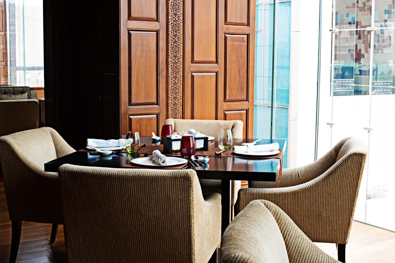 Taj City Centre Gurugram Gurgaon Ngoại thất bức ảnh A dining room